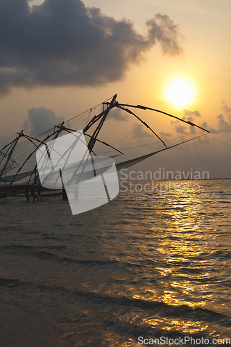 Image of Chinese fishnets on sunset. Kochi, Kerala, India