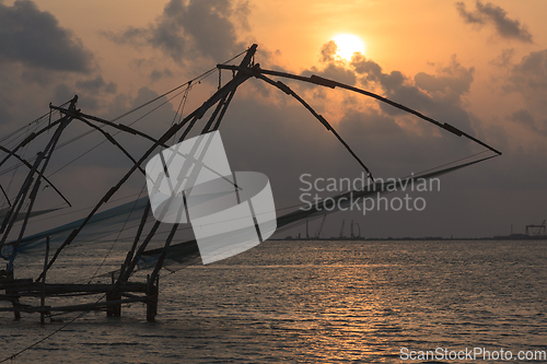 Image of Chinese fishnets on sunset. Kochi, Kerala, India