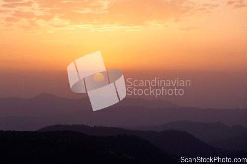 Image of Sunset in hills