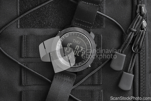 Image of Tactical watch on backpack