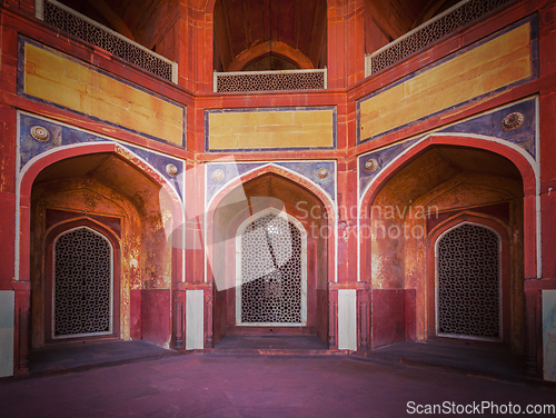 Image of Arch with carved marble window. Mughal style