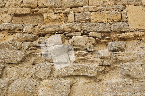 Image of Very old stone wall texture, close-up architectural background