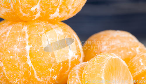 Image of peeled sweet and juicy tangerine