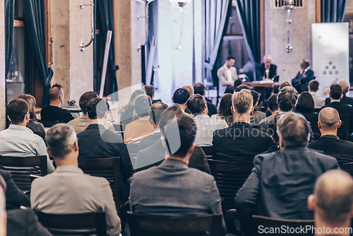 Image of Round table discussion at business conference event.