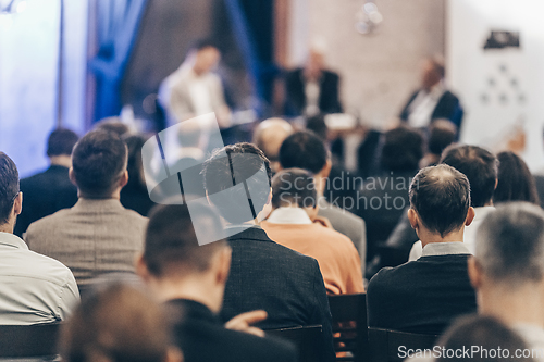 Image of Round table discussion at business conference event.