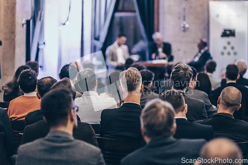 Image of Round table discussion at business conference event.