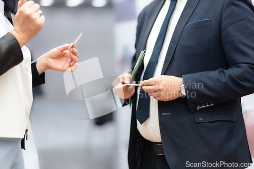 Image of Business people exchanging business card on business meeting, Business discussion talking deal concept