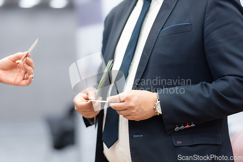 Image of Business people exchanging business card on business meeting, Business discussion talking deal concept