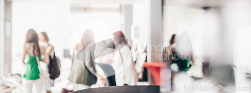 Image of Blured image of businesspeople at coffee break at conference meeting.