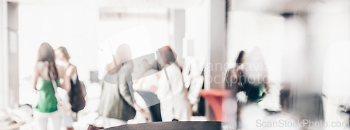 Image of Blured image of businesspeople at coffee break at conference meeting.