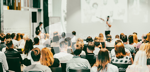 Image of Business speaker giving a talk at business conference event.