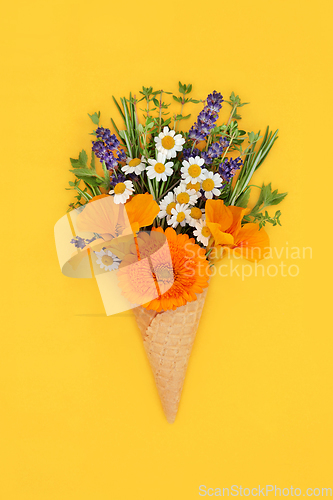Image of Summer Flowers in Waffle Ice Cream Cone Surreal Concept