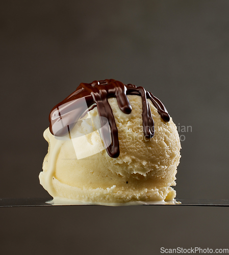 Image of vanilla ice cream with melted chocolate