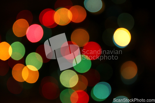 Image of Colorful festive blurry lights of Christmas decorations