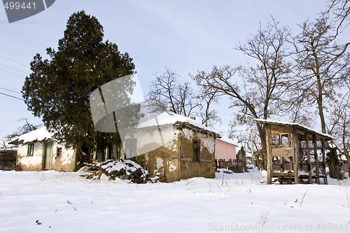 Image of traditional mud built farmhouse in winter