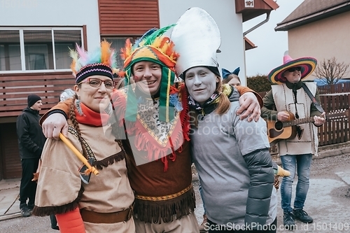 Image of People attend the Slavic Carnival Masopust