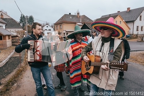 Image of People attend the Slavic Carnival Masopust