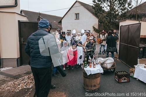 Image of People attend the Slavic Carnival Masopust