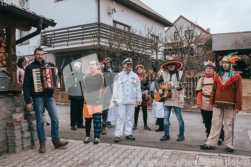 Image of People attend the Slavic Carnival Masopust