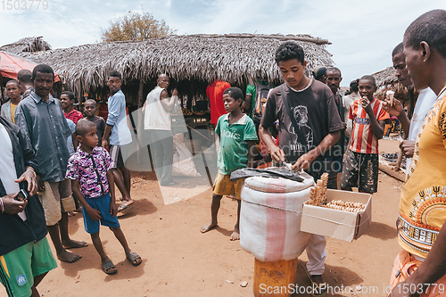 Image of Malagasy man selling ice cream, Madagascar