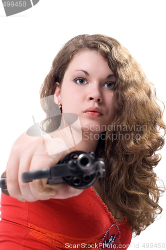 Image of Young woman with a revolver. Isolated on white 