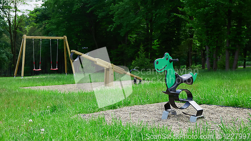 Image of Colorful playground on yard in the park.