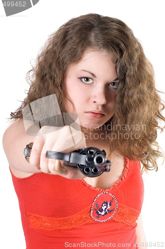 Image of Young woman with a revolver. Isolated on white background