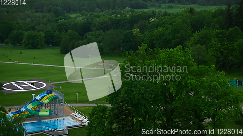 Image of swimming pool on luxury resort in forest.