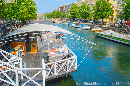 Image of Copenhagen cityscape, restaurant by canal