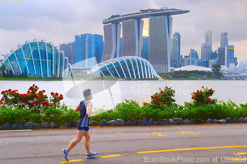 Image of Man jogging in Singapore bay