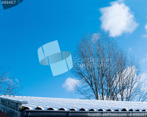 Image of Winter time - Snow on rooftops wth copyspace