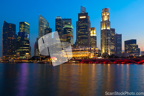 Image of Singapore skyline and river in evening