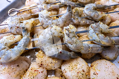 Image of raw scallops and shrimp prepared for party