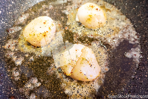 Image of Fried scallops with butter and garlic sauce