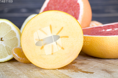 Image of orange juicy persimmon