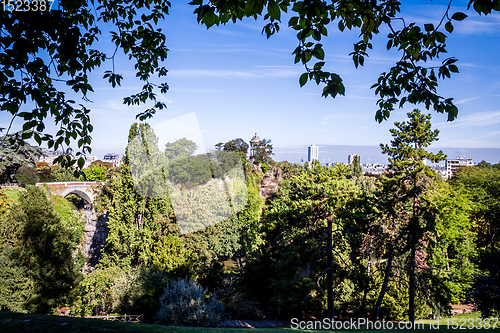Image of Sibyl temple and pond in Buttes-Chaumont Park, Paris