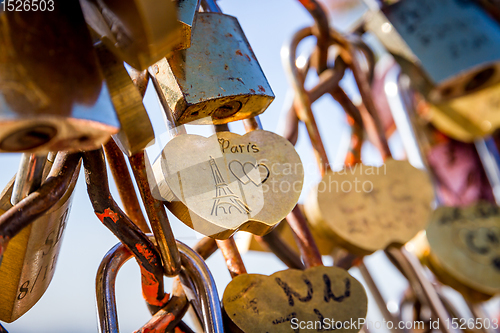 Image of Love Paris Padlocks hanging on a fence