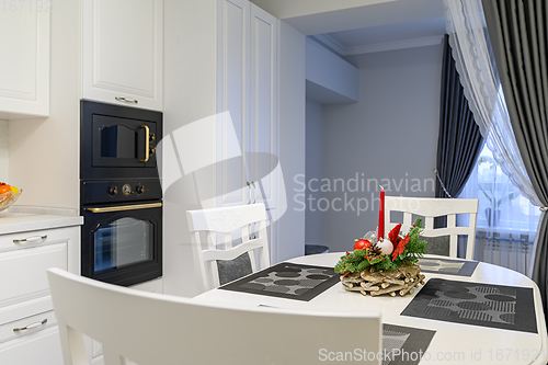 Image of White kitchen in classic style just before the Christmas