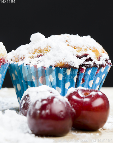 Image of cherry muffins in white sugar