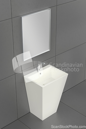 Image of White pedestal wash basin with silver faucet and mirror