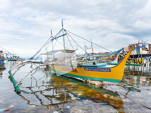 Image of Filipino fishing boat in a sea of junk