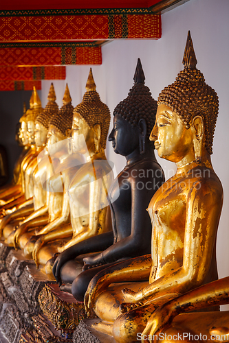 Image of Sitting Buddha statues, Thailand