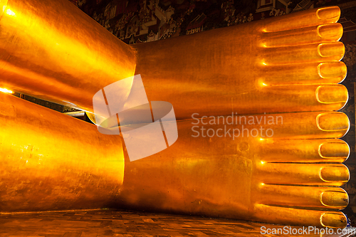 Image of Reclining gold Buddha statue feet, Thailand