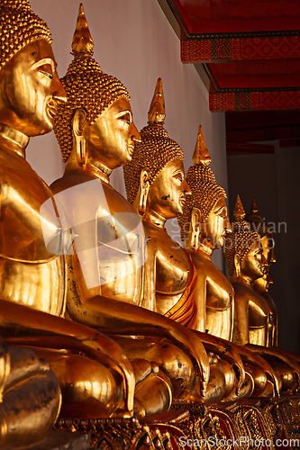 Image of Sitting Buddha statues, Thailand