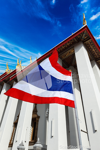 Image of Thailand flag and Buddhist temple