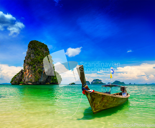 Image of Long tail boat on beach, Thailand