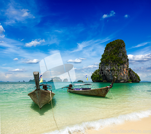 Image of Long tail boats on beach, Thailand