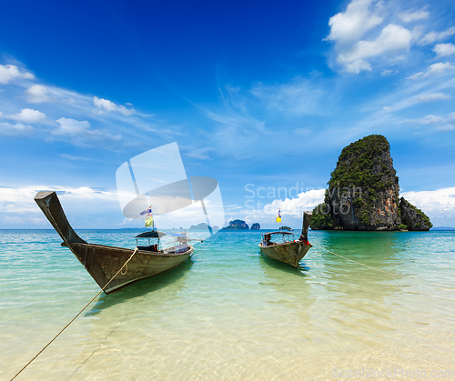 Image of Long tail boats on beach, Thailand