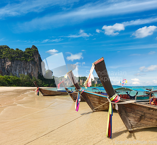 Image of Long tail boats on beach, Thailand