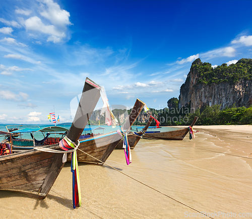 Image of Long tail boats on beach, Thailand